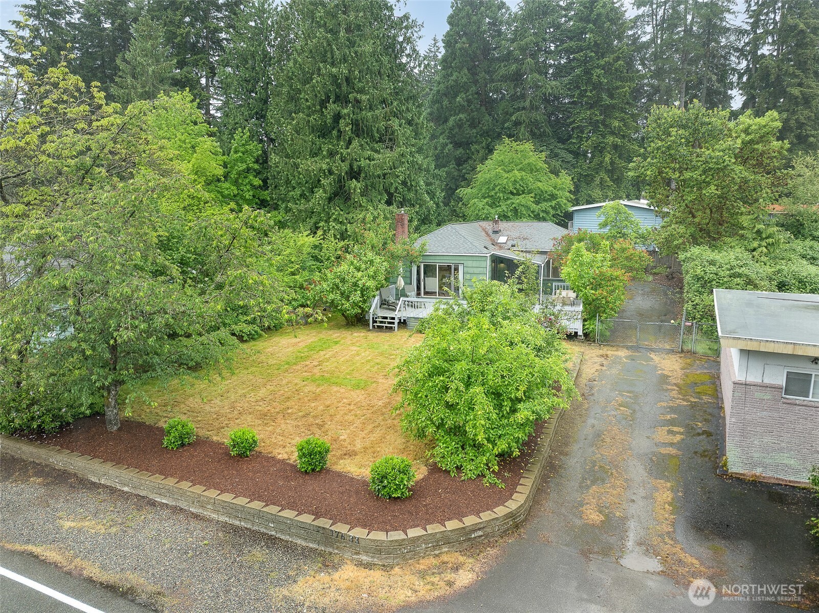 17633 10th Avenue Northeast Shoreline, WA 98155 - Photo 31 of 33 a view of a back yard of a house