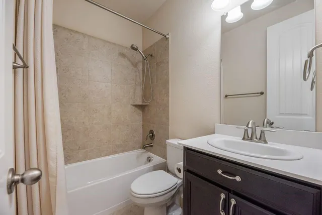 a view of a backyard with pathway