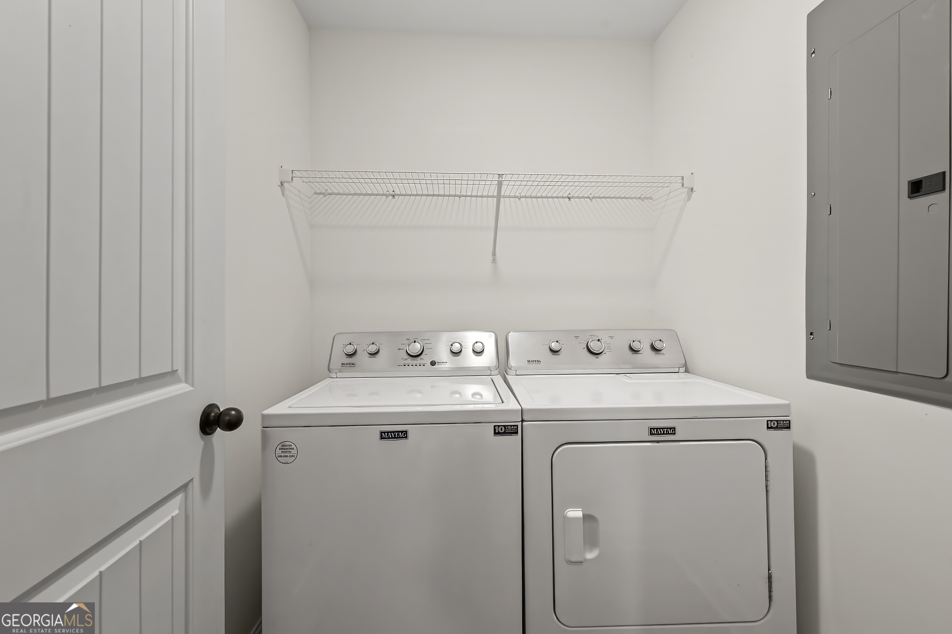 1788 Standing Rock Road Senoia, GA 30276 - Photo 22 of 36 a utility room with dryer and washer