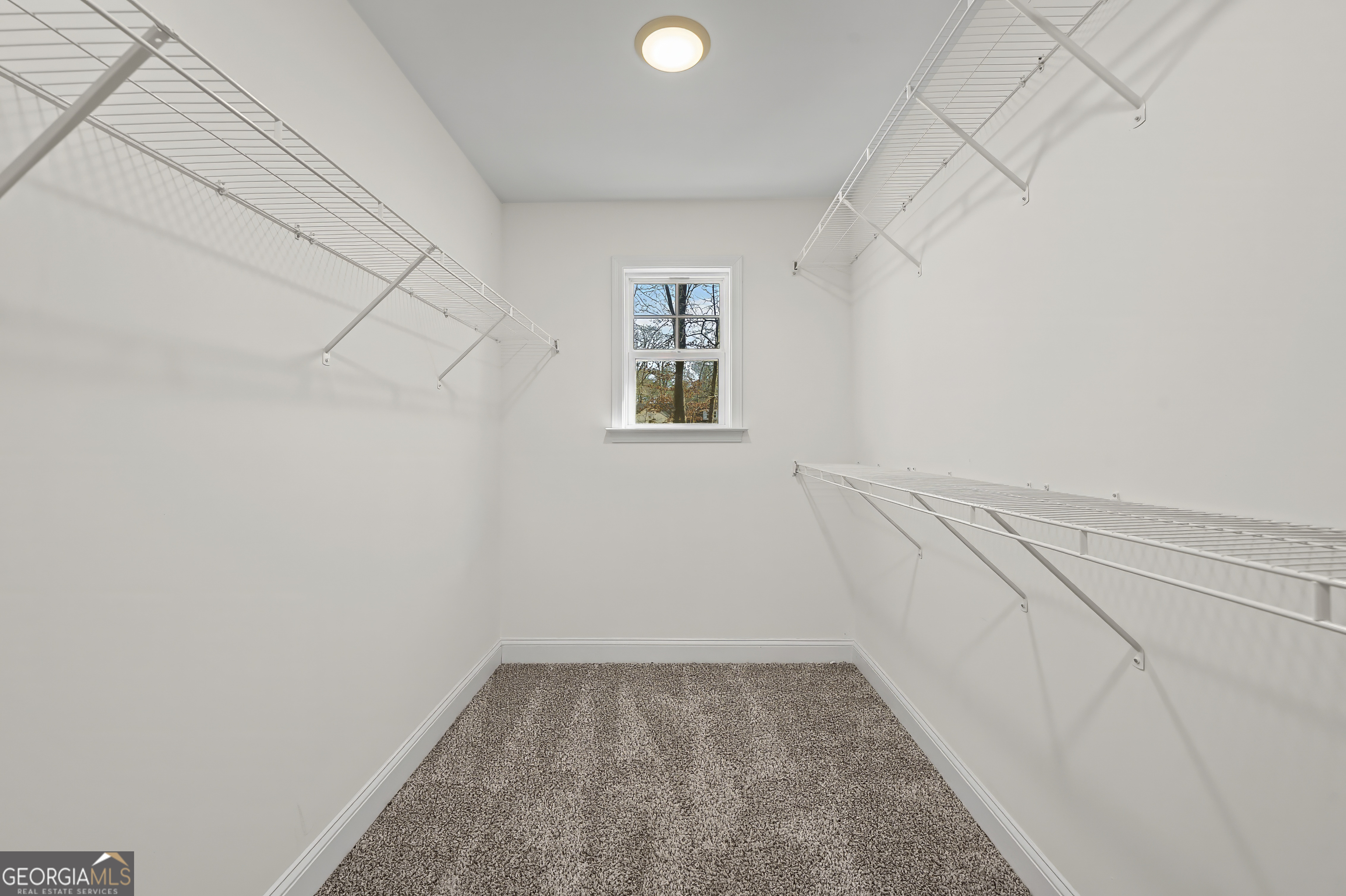 1788 Standing Rock Road Senoia, GA 30276 - Photo 31 of 36 wooden floor in an empty room with a window