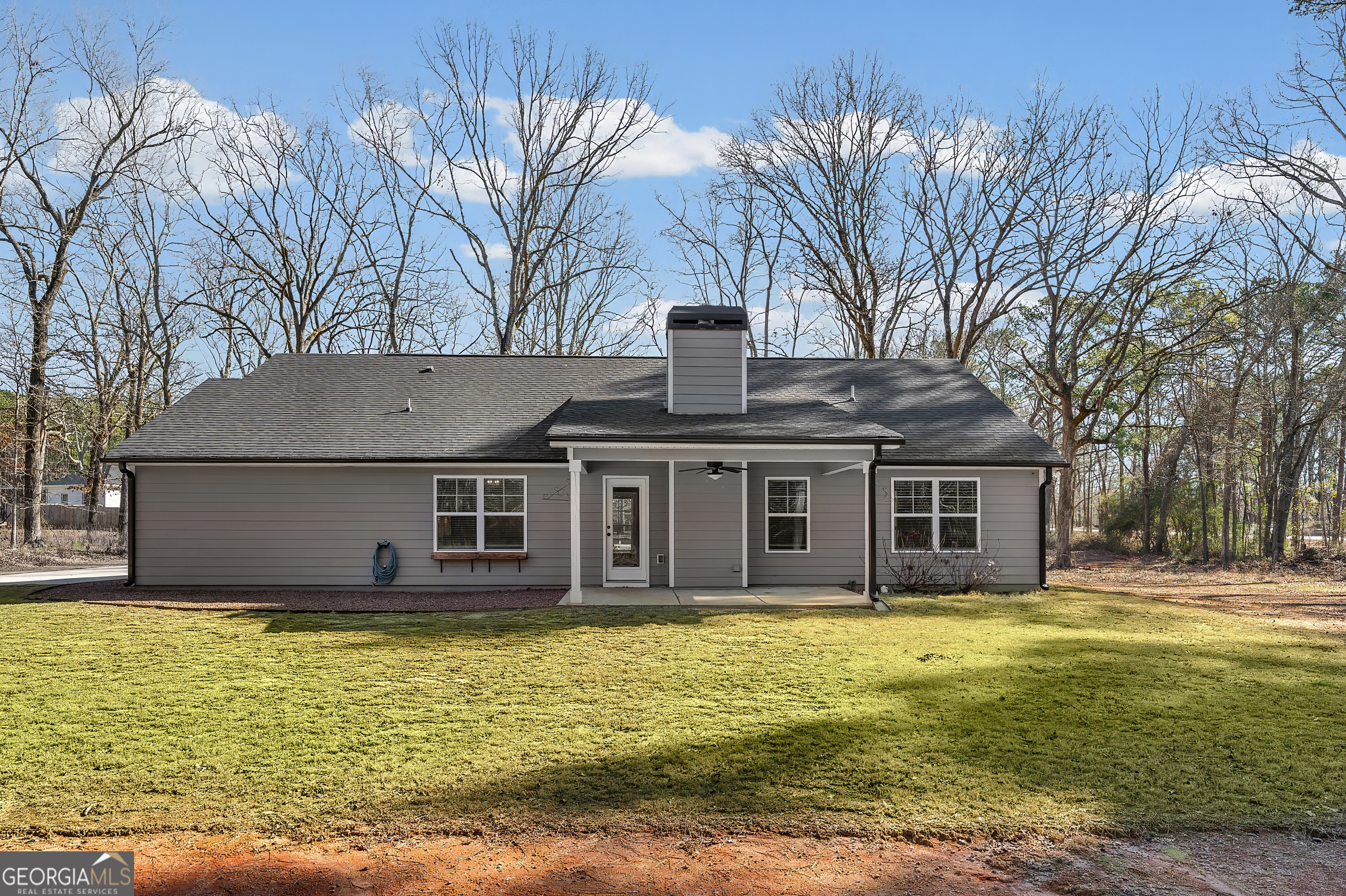 1788 Standing Rock Road Senoia, GA 30276 - Photo 32 of 36 a front view of a house with a garden