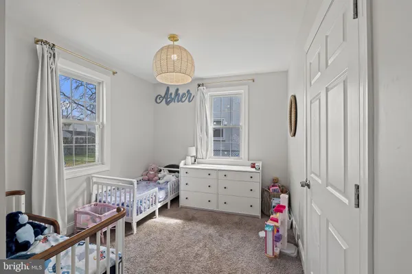 a view of livingroom with furniture and windows