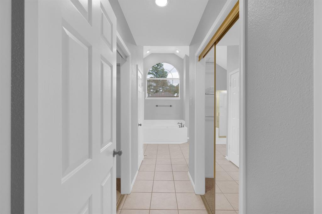 3714 Cedar Glen Lane Spring, TX 77388 - Photo 26 of 29 Hallway with light tile patterned floors and recessed lighting