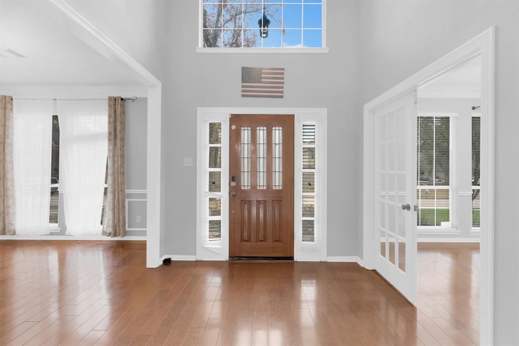 3714 Cedar Glen Lane Spring, TX 77388 - Photo 3 of 29 Foyer featuring a high ceiling, hardwood / wood-style flooring, and crown molding