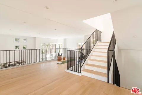 a view of a hallway with workspace