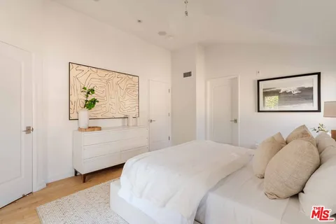 a view of a chair and bench in a balcony