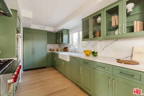 a outdoor space with a couch and chairs