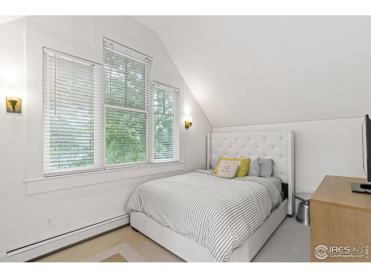 3161 7th Street Boulder, CO 80304 - Photo 21 of 39 2nd bedroom with large windows and vaulted ceilings..