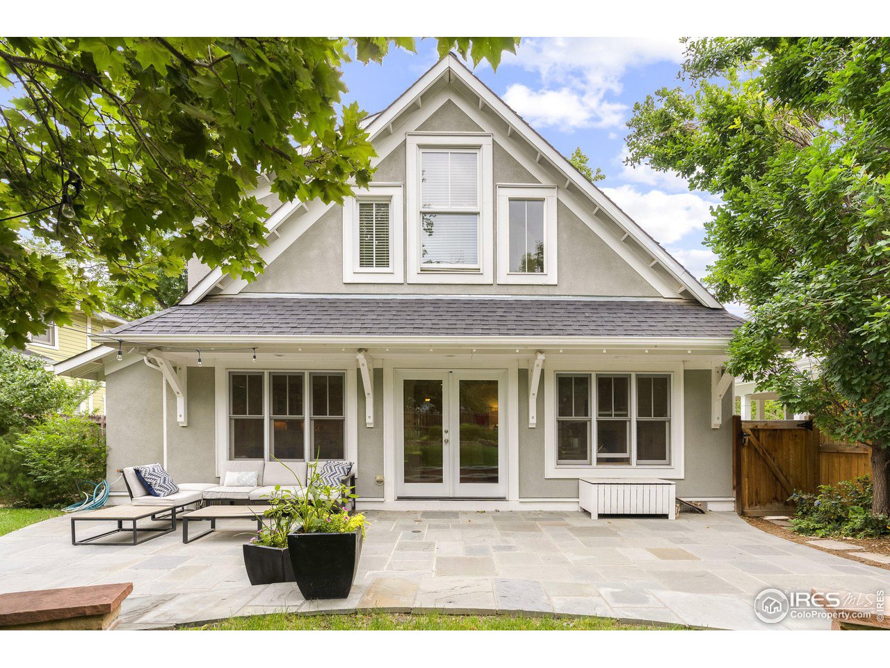 3161 7th Street Boulder, CO 80304 - Photo 25 of 39 Back of home showing stone patio