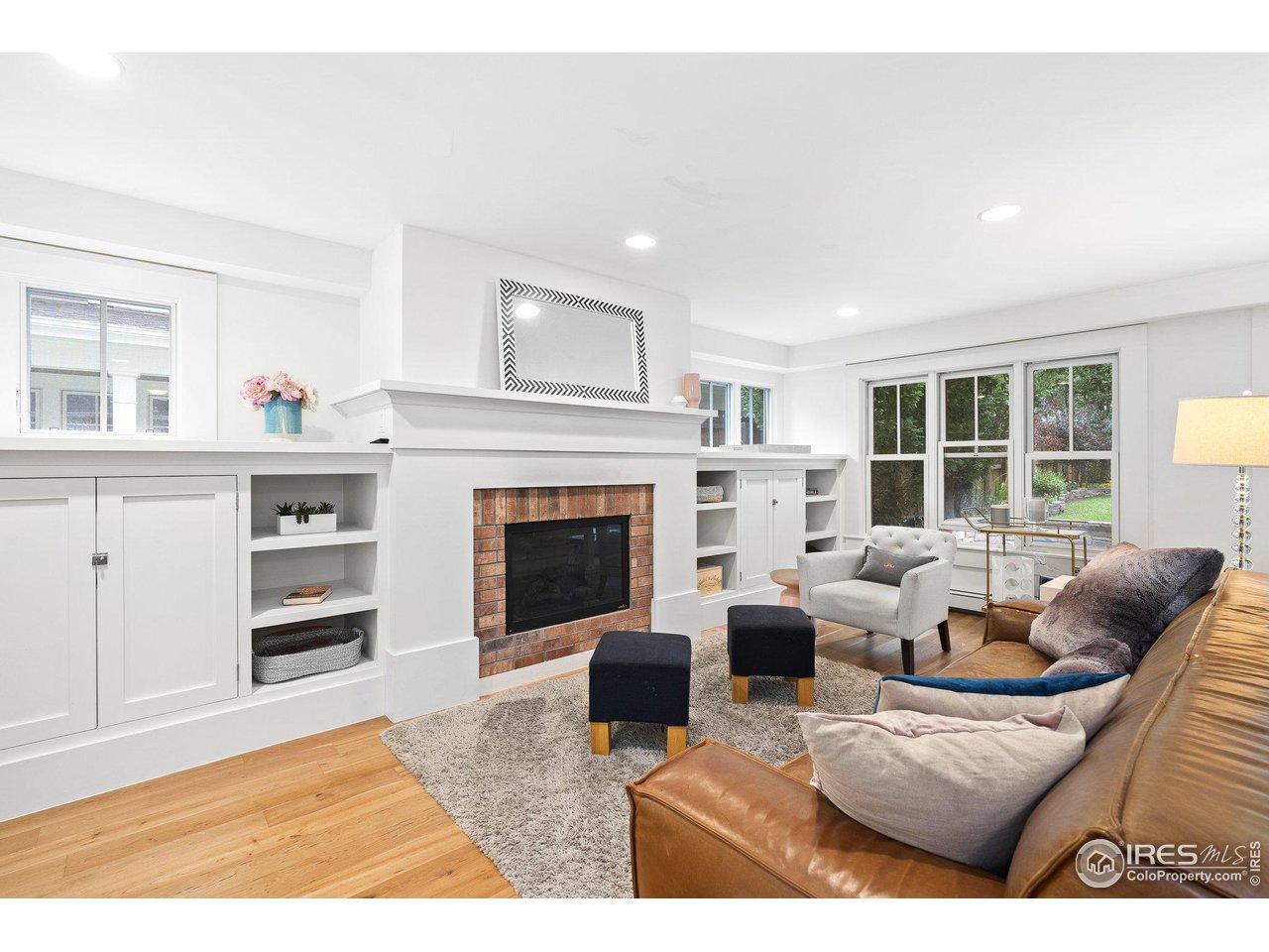 3161 7th Street Boulder, CO 80304 - Photo 8 of 39 Living room with gas fireplace and plenty of built ins.