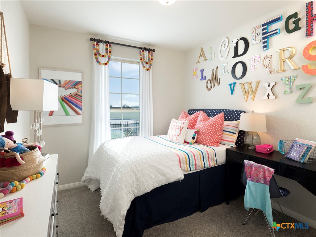 137 Dakota Ridge Cibolo, TX 78108 - Photo 5 of 7 a bedroom with a bed and a window