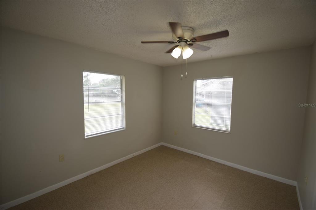 115 Leelon Road, Unit 115 Lakeland, FL 33809 - Photo 11 of 14 a view of an empty room with a window