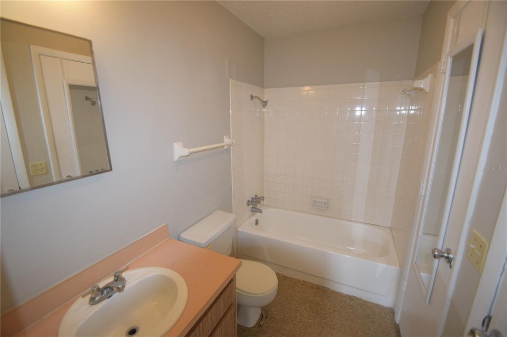 115 Leelon Road, Unit 115 Lakeland, FL 33809 - Photo 13 of 14 a bathroom with a sink and toilet