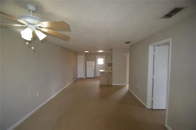 a view of a livingroom and a chandelier
