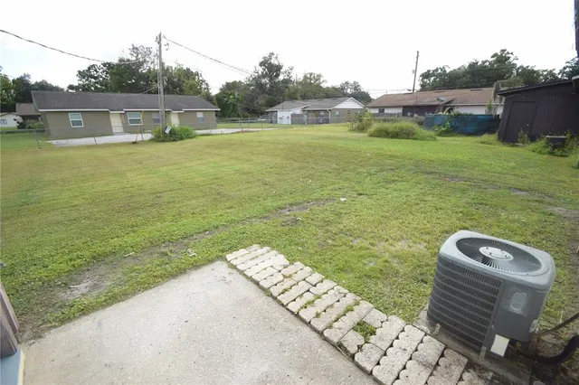 a view of a lake with a yard