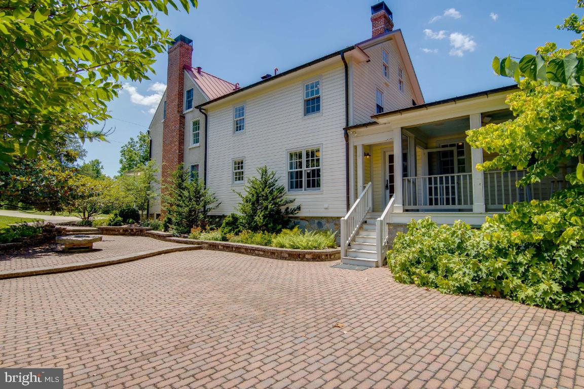 1201 Gold Mine Road Brookeville, MD 20833 - Photo 38 of 61 Paver patio surrounding side and rear of home