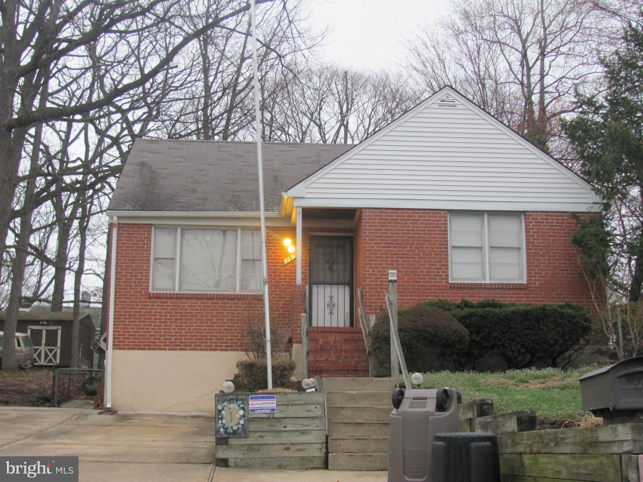 7919 Hillendale Road Baltimore, MD 21234 - Photo 2 of 29 a front view of a house with garden