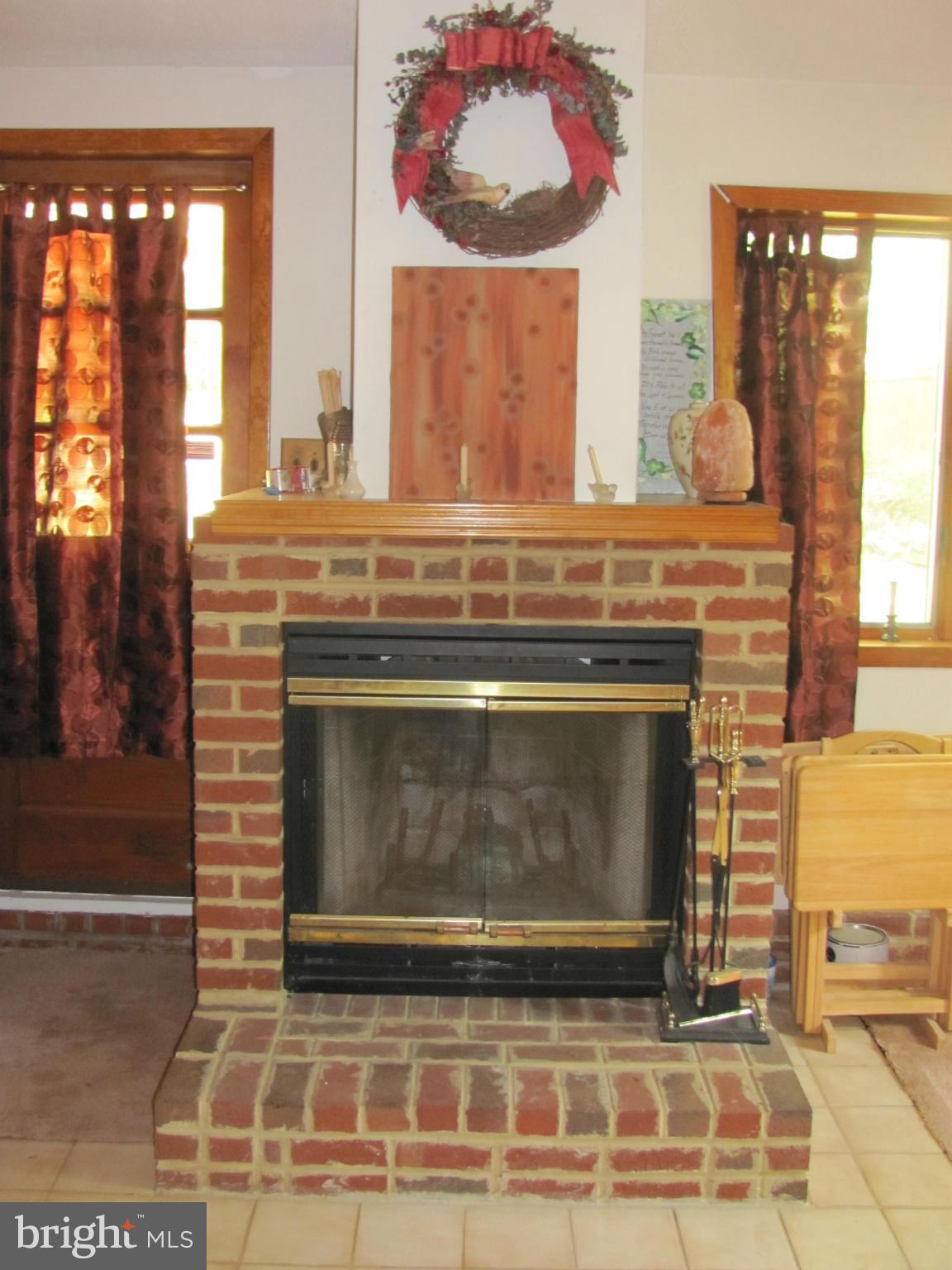 7919 Hillendale Road Baltimore, MD 21234 - Photo 11 of 29 a stove top oven sitting inside of a kitchen