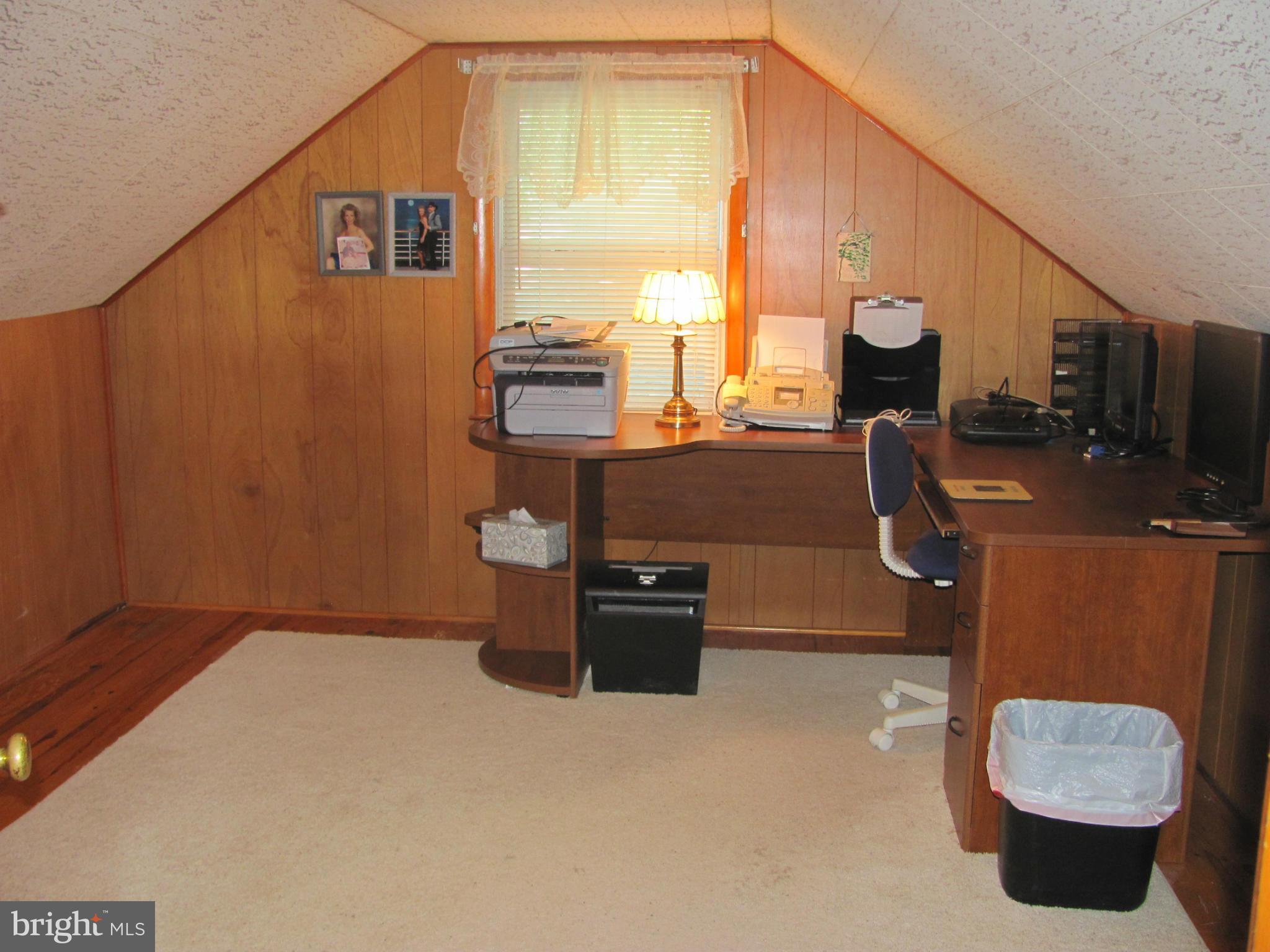 7919 Hillendale Road Baltimore, MD 21234 - Photo 17 of 29 a bedroom with a bed and wooden floor