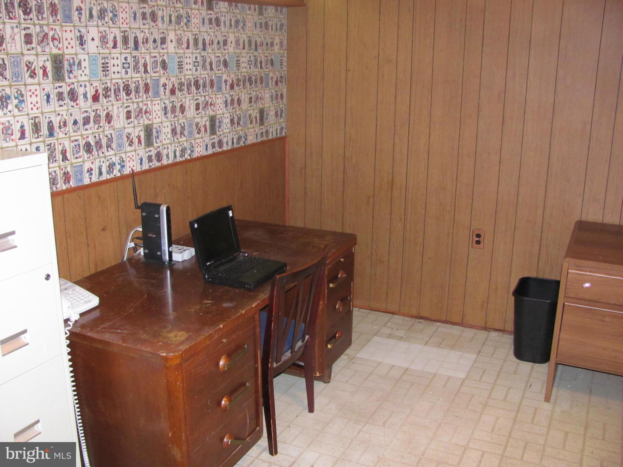 7919 Hillendale Road Baltimore, MD 21234 - Photo 21 of 29 a dining room with furniture and wooden floor