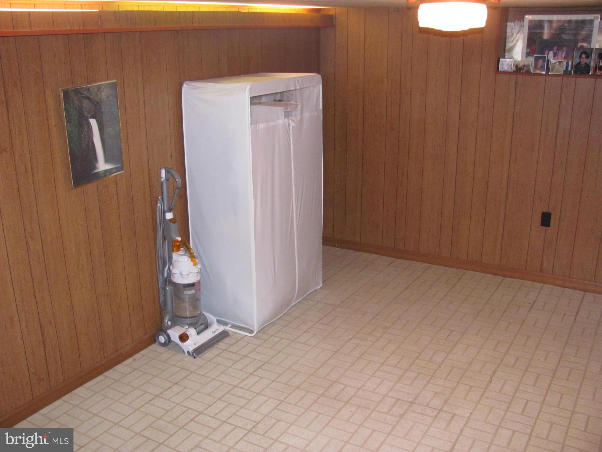 7919 Hillendale Road Baltimore, MD 21234 - Photo 24 of 29 a view of an empty room with wooden door