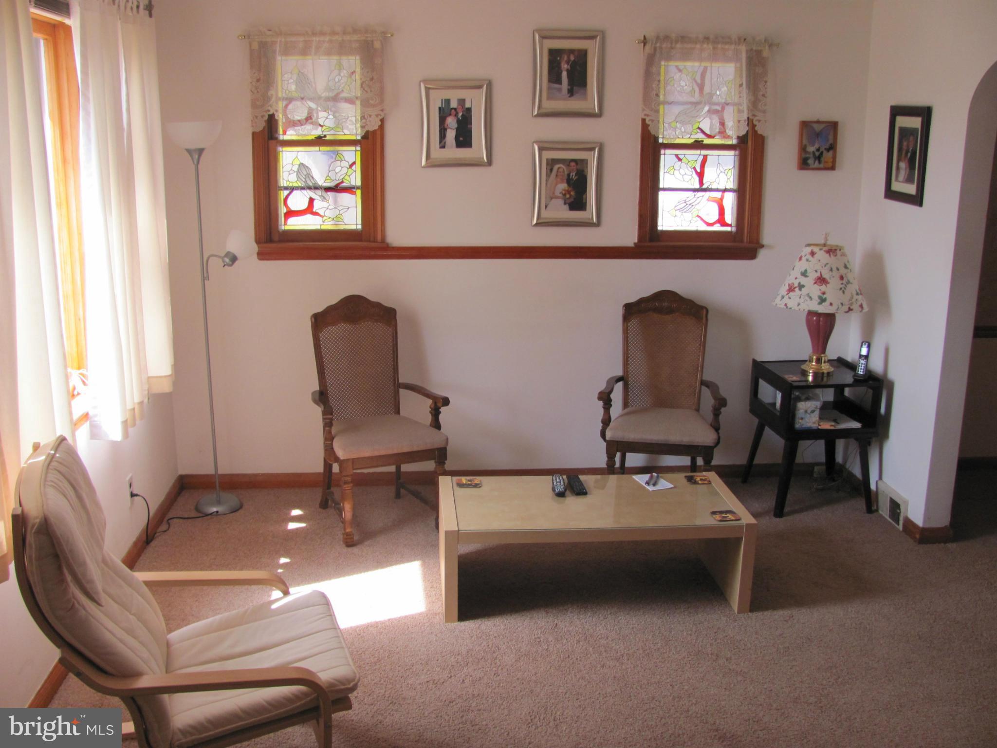 7919 Hillendale Road Baltimore, MD 21234 - Photo 5 of 29 a living room with furniture
