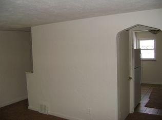 733-735 Shadycrest Road Pittsburgh, PA 15216 - Photo 12 of 18 735 living room looking into kitchen prior to tenants moving in