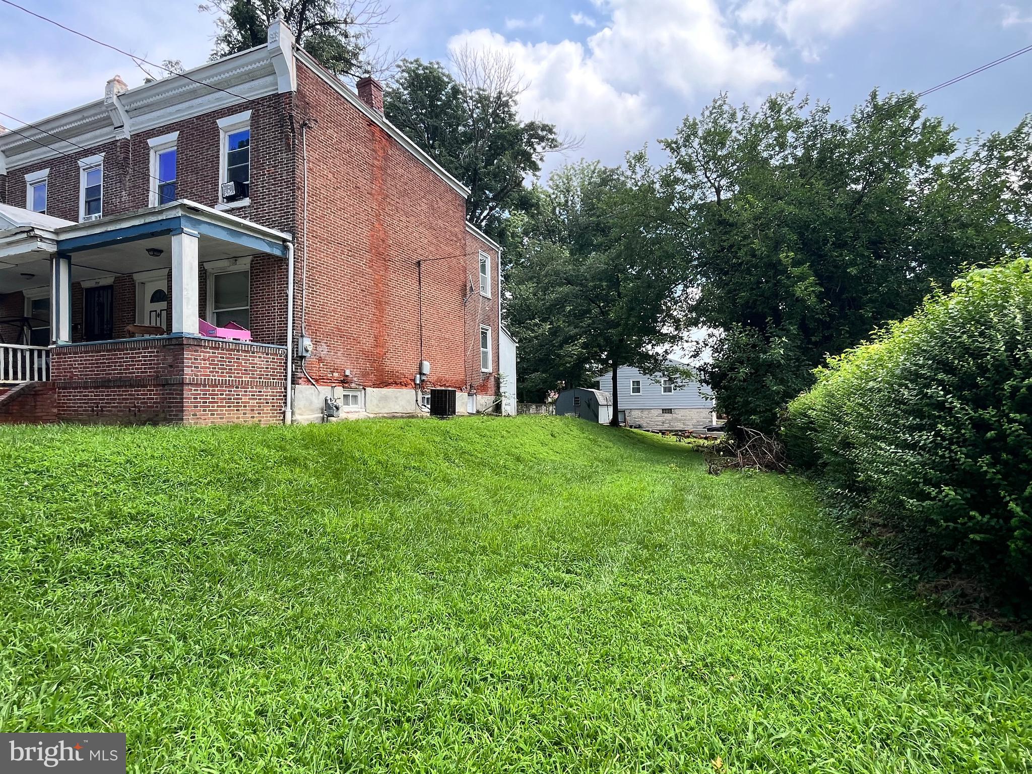 702 Cedar Avenue Lansdowne, PA 19050 - Photo 3 of 9 a view of a house with a yard and sitting area