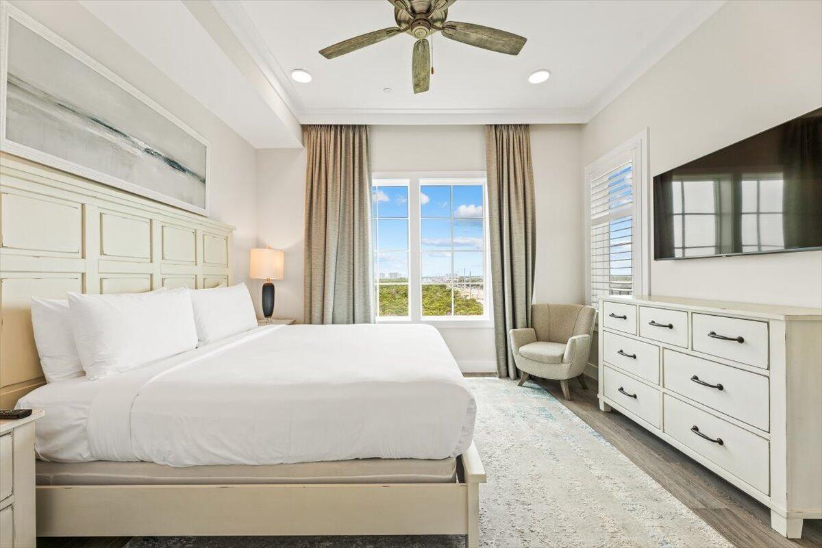 206 Henderson Resort Way, Unit 5403 Destin, FL 32541 - Photo 15 of 41 a bedroom with a bed and a window