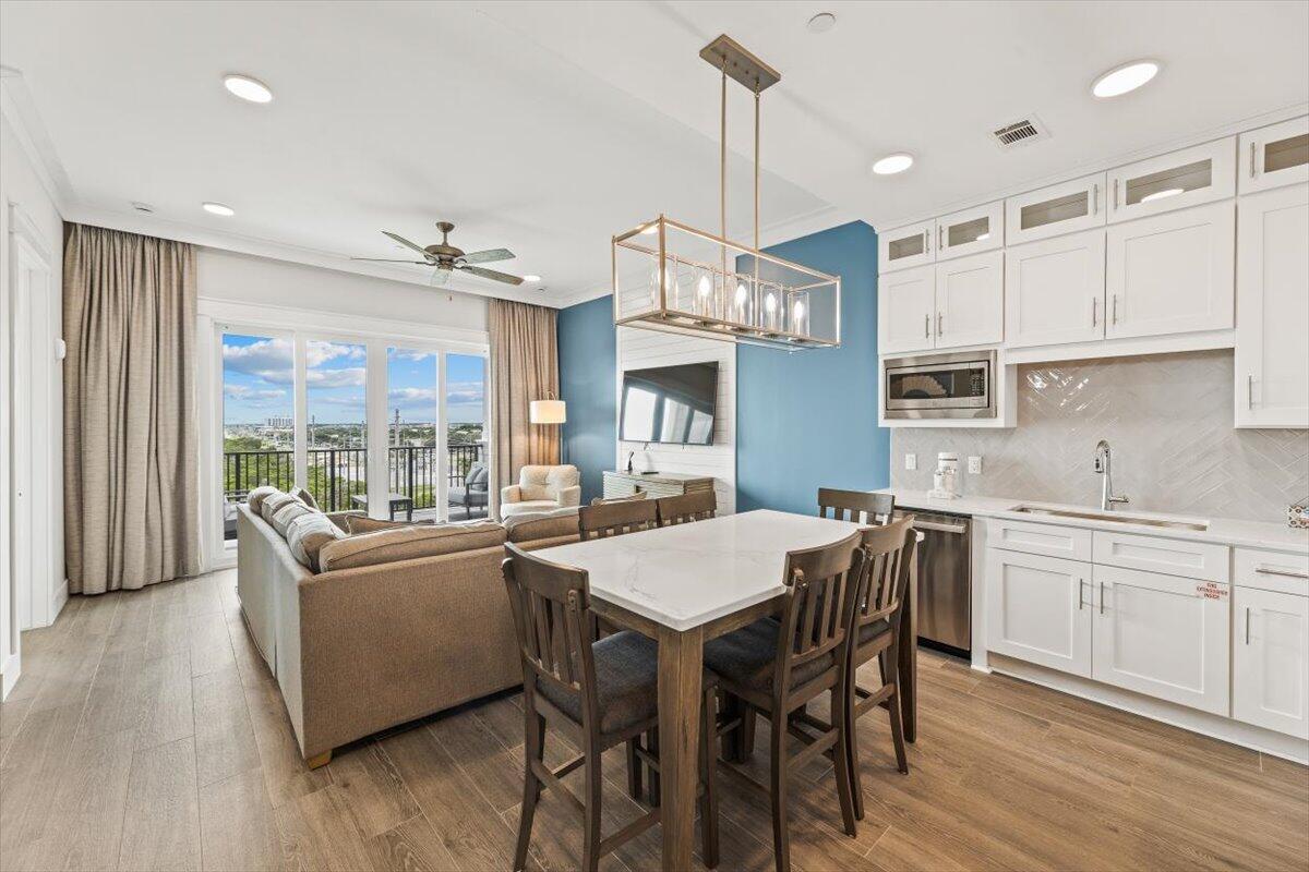 206 Henderson Resort Way, Unit 5403 Destin, FL 32541 - Photo 6 of 41 a view of kitchen with living room and furniture