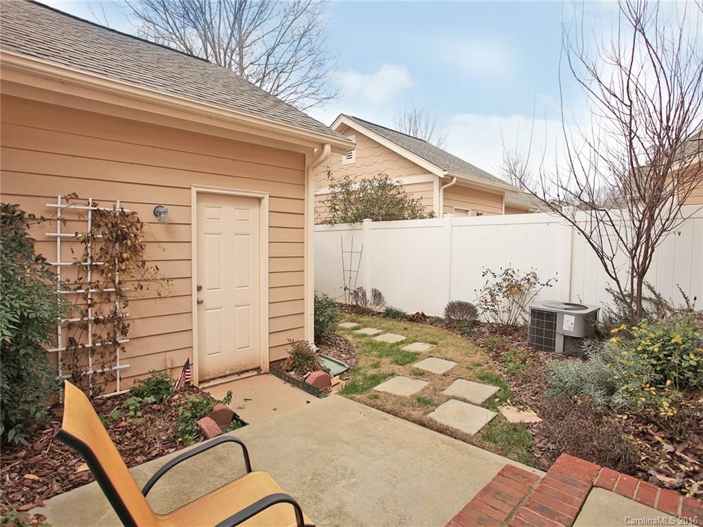 1050 Market Street, Unit 1050 Fort Mill, SC 29708 - Photo 2 of 20 a view of a back yard of the house