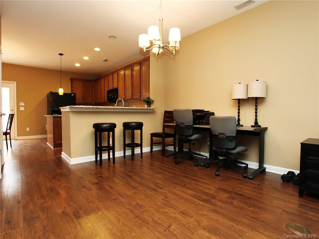 1050 Market Street, Unit 1050 Fort Mill, SC 29708 - Photo 7 of 20 a view of kitchen with sink and breakfast area
