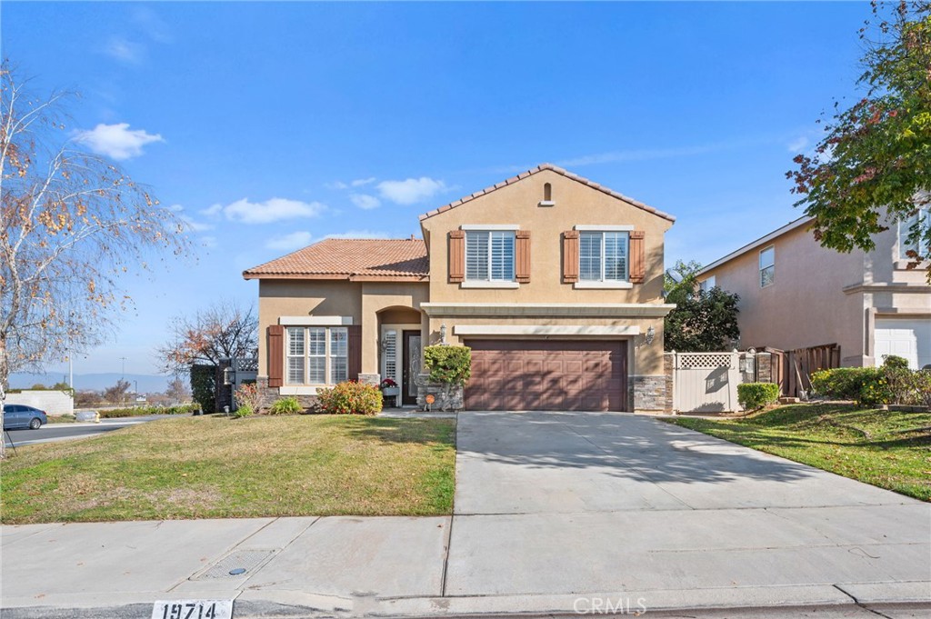 19714 Rotterdam Street Riverside, CA 92508 - Photo 1 of 46 a front view of a house with a yard