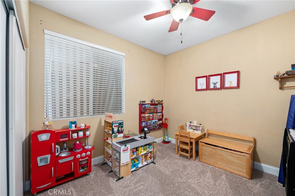 19714 Rotterdam Street Riverside, CA 92508 - Photo 21 of 46 a living room with furniture and a window
