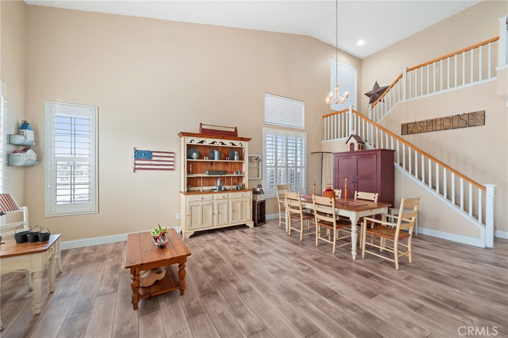 19714 Rotterdam Street Riverside, CA 92508 - Photo 3 of 46 a living room with furniture and a wooden floor