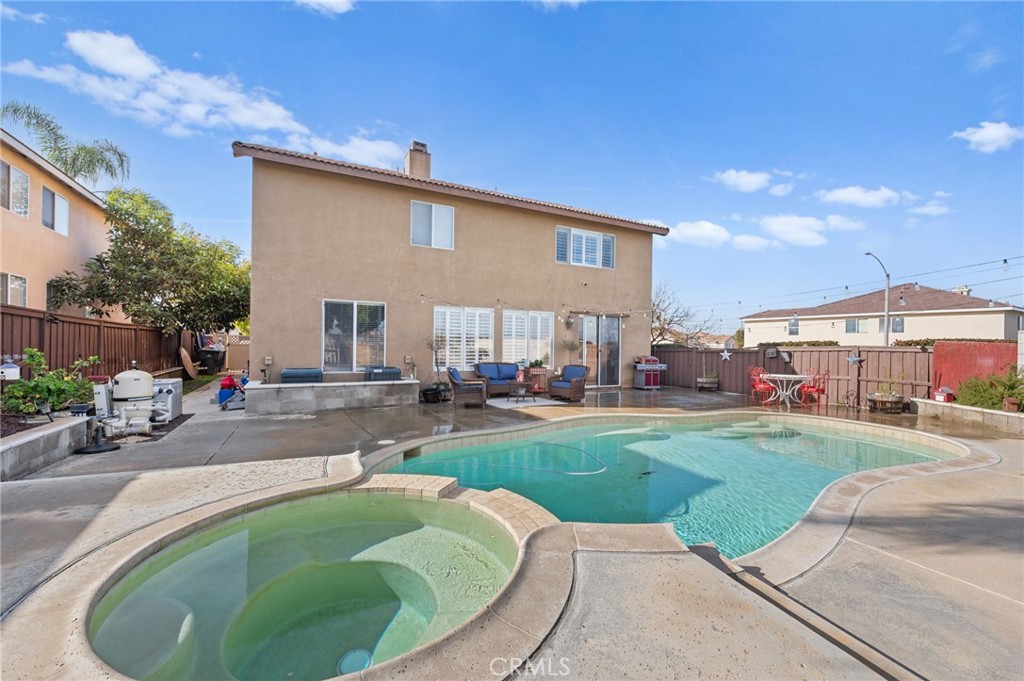 19714 Rotterdam Street Riverside, CA 92508 - Photo 38 of 46 a view of a house with a patio