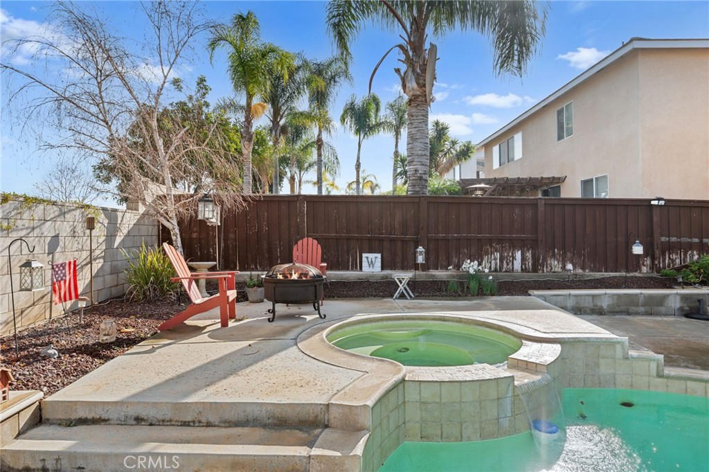 19714 Rotterdam Street Riverside, CA 92508 - Photo 40 of 46 a view of a swimming pool with a patio
