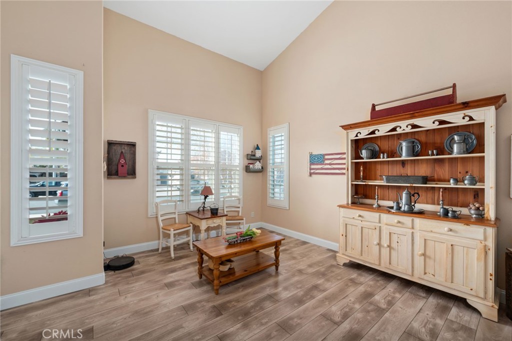 19714 Rotterdam Street Riverside, CA 92508 - Photo 4 of 46 a living room with furniture a rug and a window