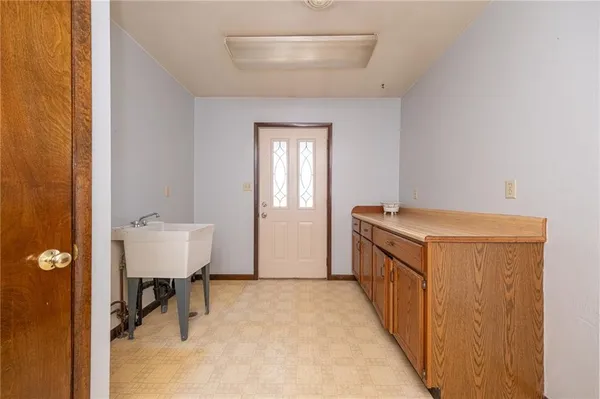 a view of a hallway with entryway