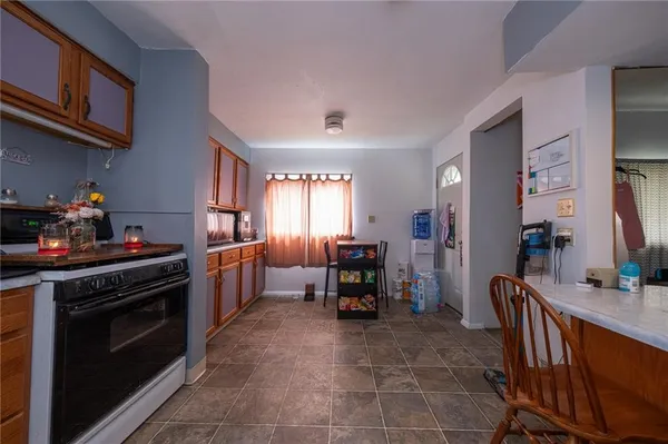 a bedroom with bed and a desk