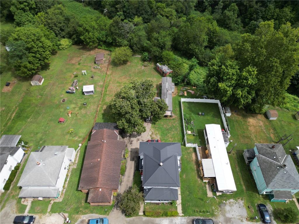 221-227 Spring Street Harwick, PA 15049 - Photo 46 of 49 an aerial view of a house with a yard basket ball court and outdoor seating