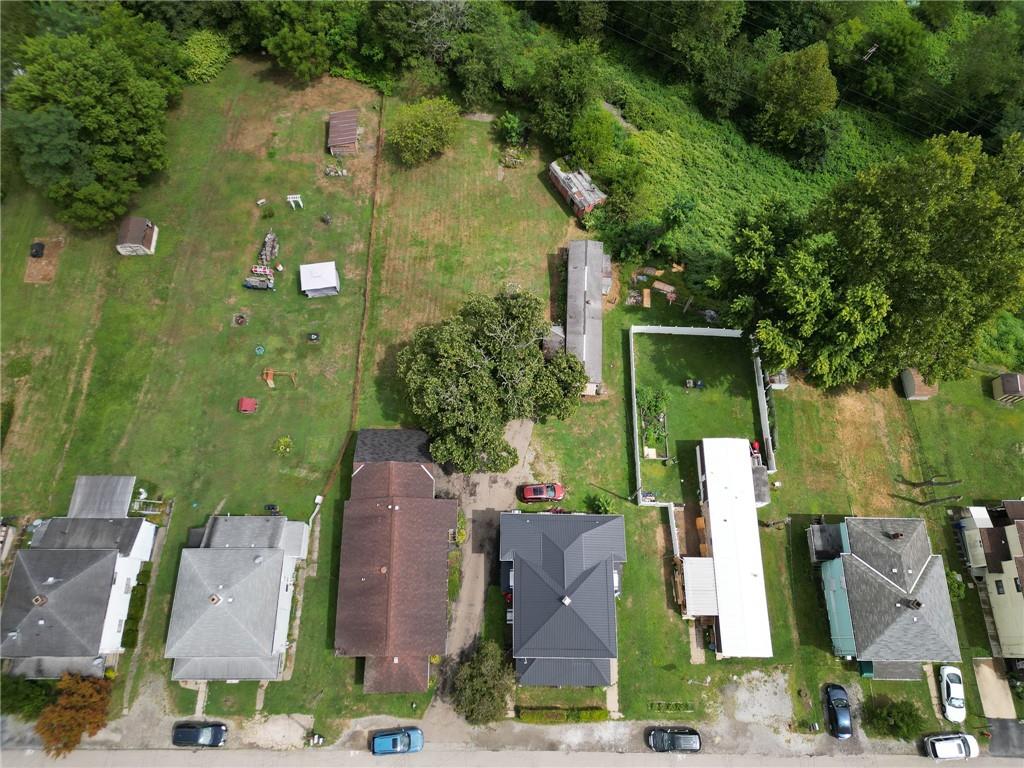 221-227 Spring Street Harwick, PA 15049 - Photo 47 of 49 an aerial view of a house with garden space and street view