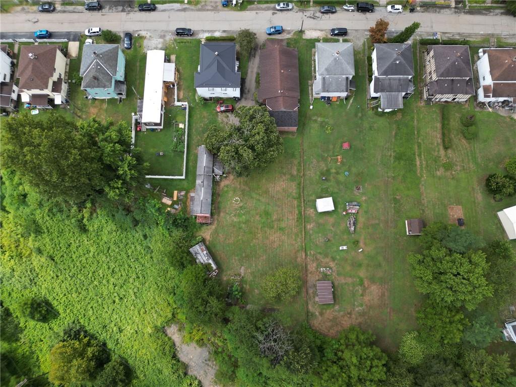 221-227 Spring Street Harwick, PA 15049 - Photo 49 of 49 an aerial view of houses with yard