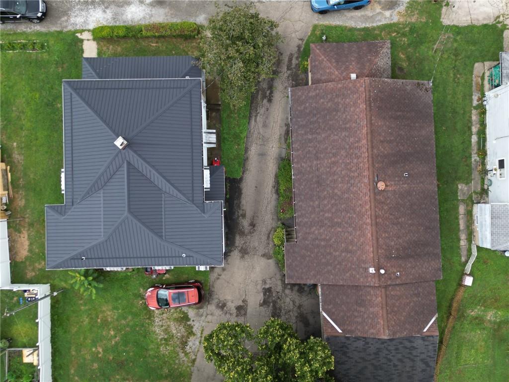 221-227 Spring Street Harwick, PA 15049 - Photo 7 of 49 an aerial view of a house with a yard