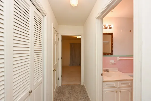 a kitchen with stainless steel appliances a refrigerator oven a sink dishwasher and a stove with wooden floor