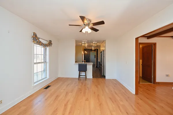 a view of a house with a snow in the yard