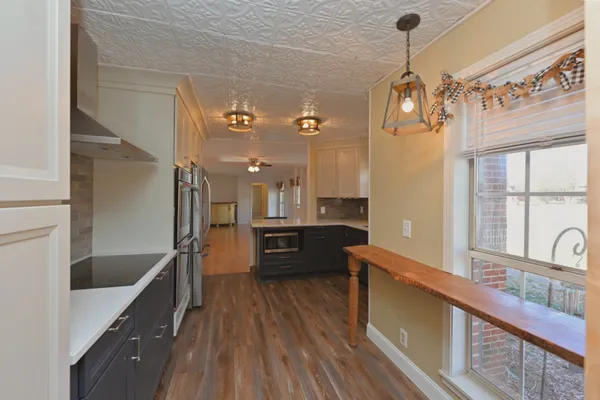 a bedroom with a bed and a table