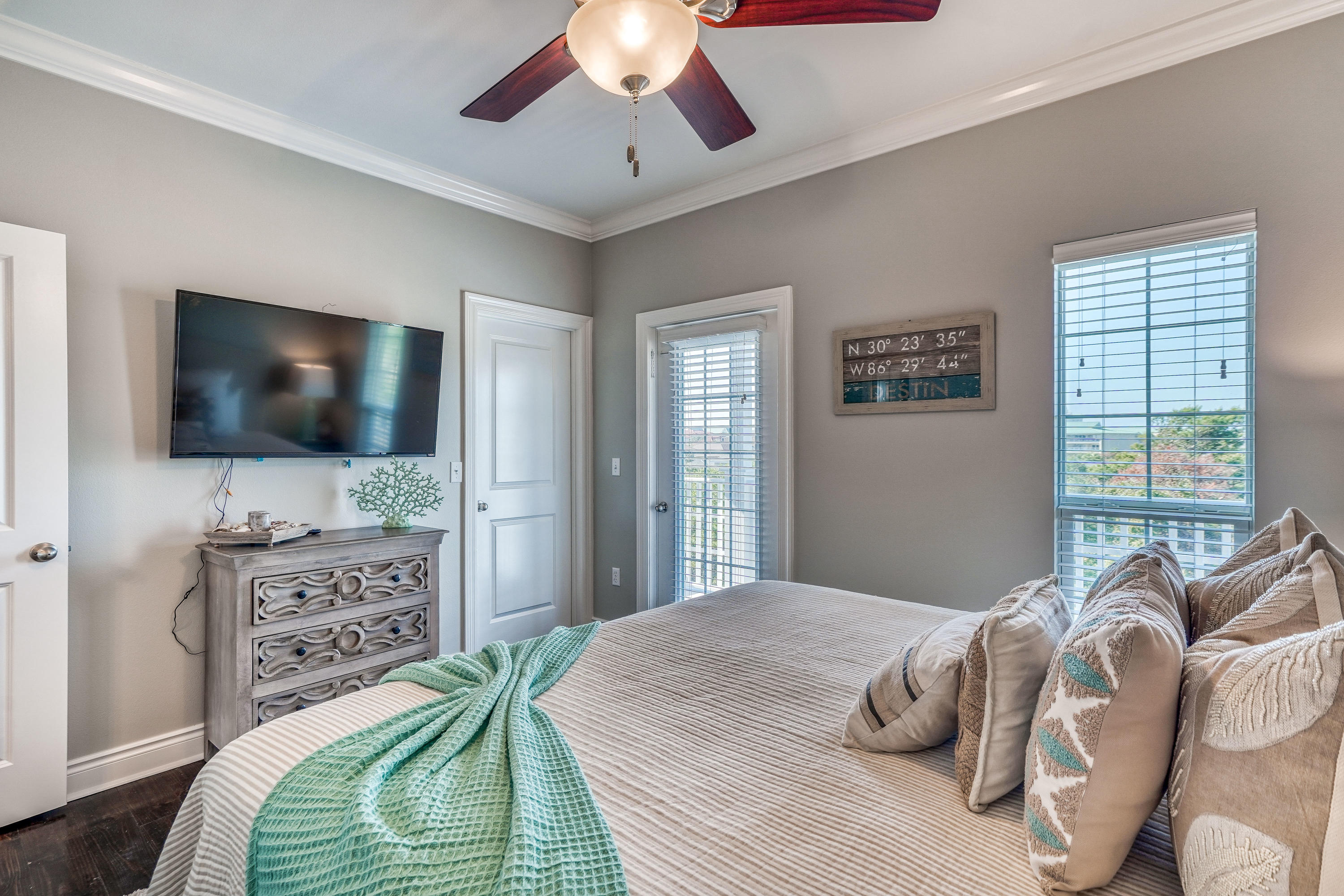 29 Payne Street Miramar Beach, FL 32550 - Photo 23 of 49 a bedroom with a bed and a flat screen tv