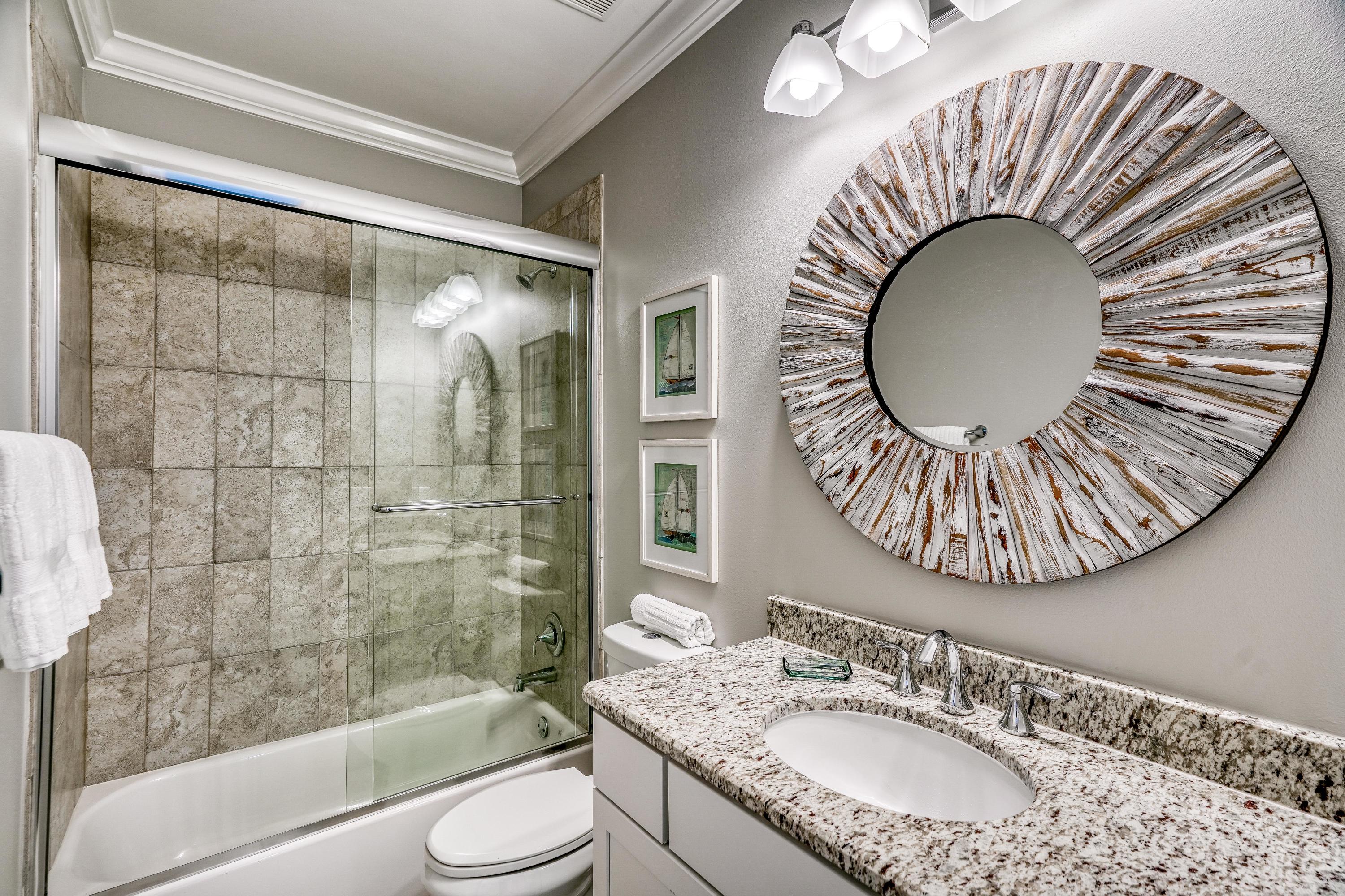 29 Payne Street Miramar Beach, FL 32550 - Photo 26 of 49 a bathroom with a granite countertop sink mirror vanity and toilet