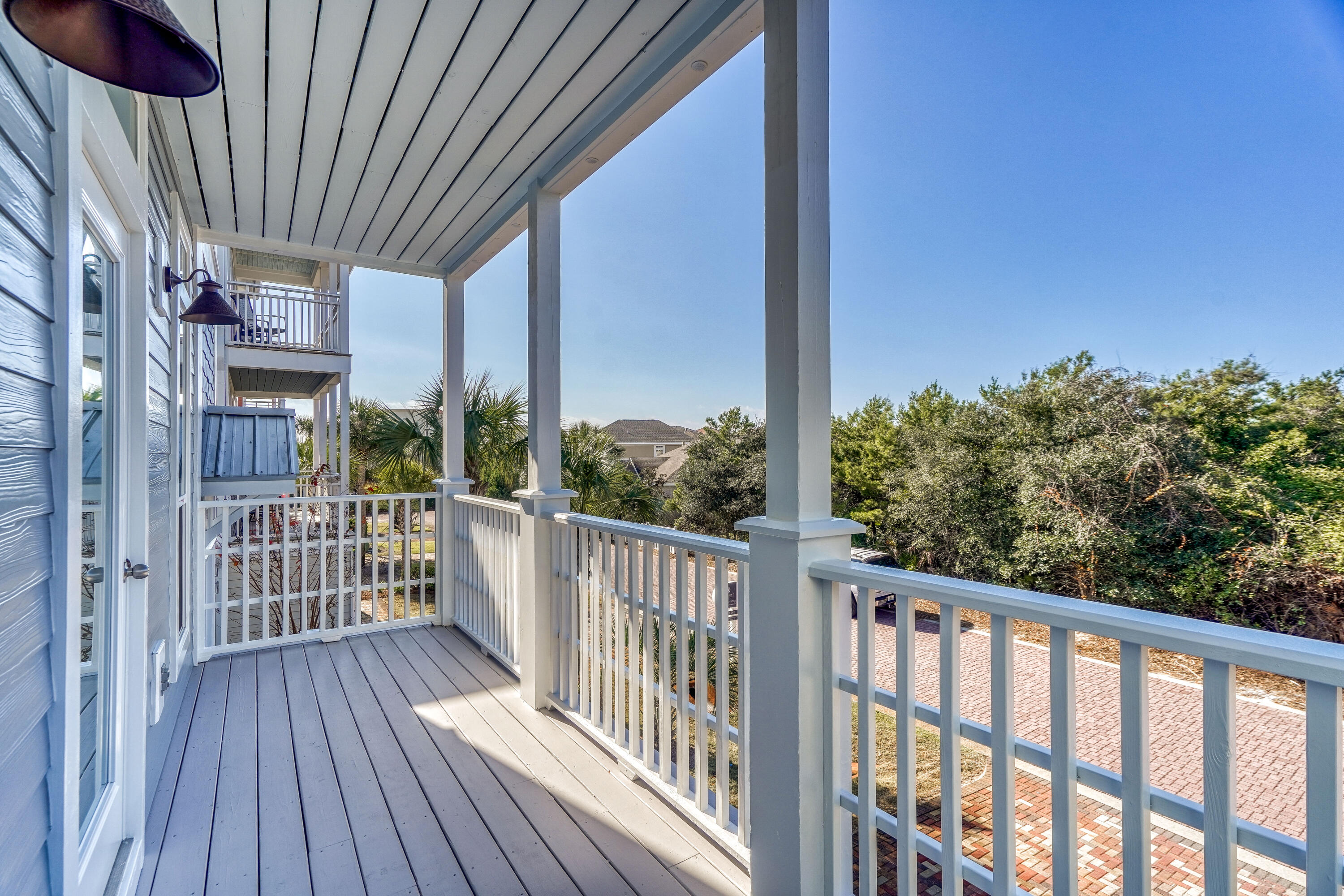 29 Payne Street Miramar Beach, FL 32550 - Photo 30 of 49 a view of a balcony with wooden floor